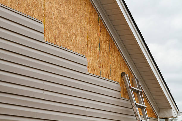 Professional Siding Repair technician working in Four Oaks, NC